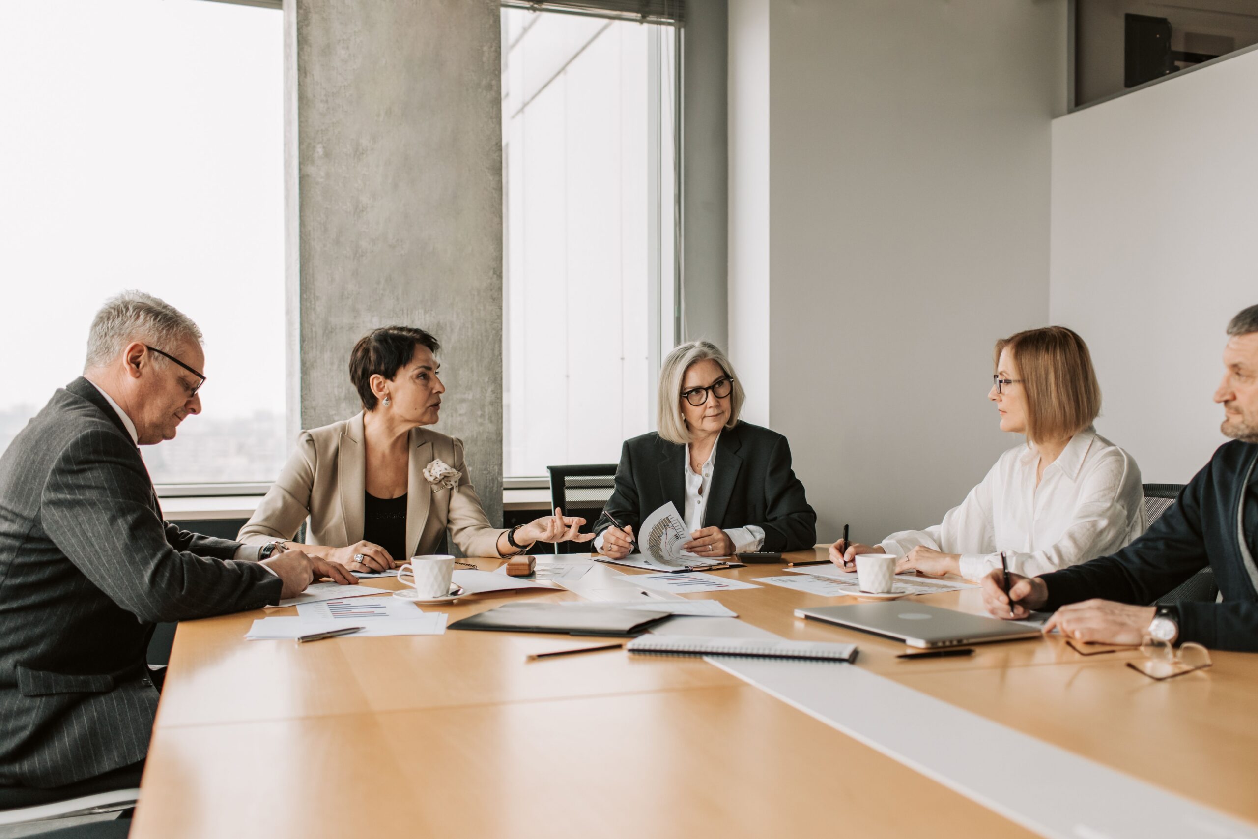 People in the middle of a meeting.